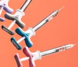 Syringes arranged in a pattern