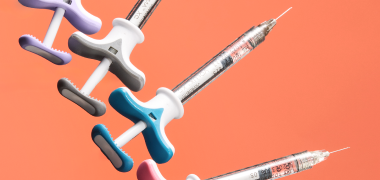 Syringes arranged in a pattern